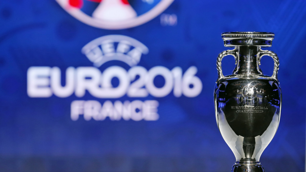 The trophy of the Euro 2016 is seen before the UEFA Euro 2016 qualifying draw in Nice, February 23, 2014. The 53 teams will be split into eight groups of six and one group of five. The top two sides in each group plus the best third-placed team will qualify directly for Euro 2016 in France. The UEFA Euro 2016 will be held in France from June 10 to July 10 2016. REUTERS/Jean-Paul Pelissier (FRANCE - Tags: SPORT SOCCER) - RTX19CW4